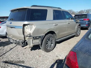 2018 Ford Expedition XLT with VIN 1FMJU1HT8JEA36709, listed as a IAAI auction lot 41754675 with 130,992 mi miles and . Bid and sale history available at DreamBid. Image 4.
