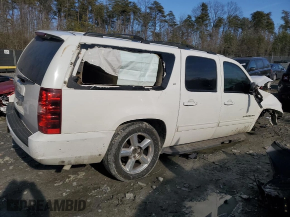2013 Chevrolet Suburban LT with VIN 1GNSKJE74DR239851, listed as a Copart auction lot 44856425 with 203,074 mi miles and Salvage Title. Bid and sale history available at DreamBid. Image 3.