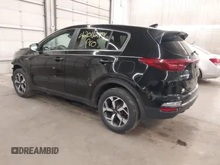 2020 Kia Sportage LX with VIN KNDPMCACXL7804797, listed as a IAAI auction lot 42011299 with 49,793 mi miles and . Bid and sale history available at carsss.com. Image 3.