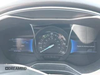 2013 Ford Fusion SE Hybrid z VIN 3FA6P0LU4DR259073, wystawiony jako IAAI lot #42197143 z przebiegiem 87 337 mil mil oraz . Historia ofert i sprzedaży dostępna na DreamBid. Obrazek 7.