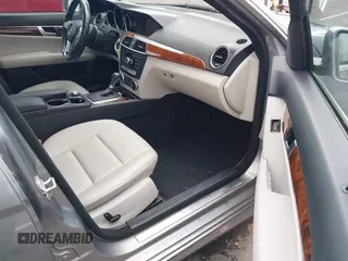 2014 Mercedes-Benz C with VIN WDDGF8AB5ER318166, listed as a IAAI auction lot 41911146 with 115,691 mi miles. Bid and sale history available at carsss.com. Image 5.