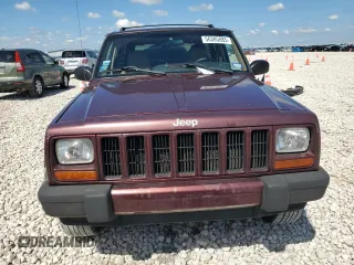 2001 Jeep Cherokee Sport with VIN 1J4FT48S21L538823, listed as a Copart auction lot 56385885 with 157,808 mi miles and Clean title. Bid and sale history available at DreamBid. Image 5.