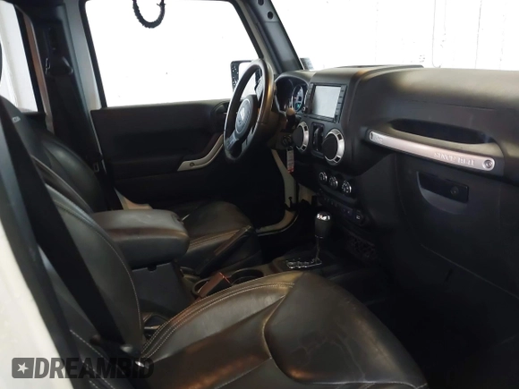 2016 Jeep Wrangler Unlimited Rubicon with VIN 1C4HJWFG4GL127379, listed as a IAAI auction lot 41732688 with 110,193 mi miles. Bid and sale history available at carsss.com. Image 5.