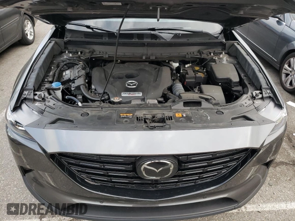 2022 Mazda CX-9 Touring Plus with VIN JM3TCBAY2N0618052, listed as a Copart auction lot 40419444 with 13,601 mi miles and Clean Title. Bid and sale history available at carsss.com. Image 12.