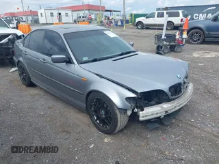 2003 BMW 3 Series 330i with VIN WBAEV53463KM04252, listed as a IAAI auction lot 42006945 with 193,387 mi miles. Bid and sale history available at carsss.com. Image 1.
