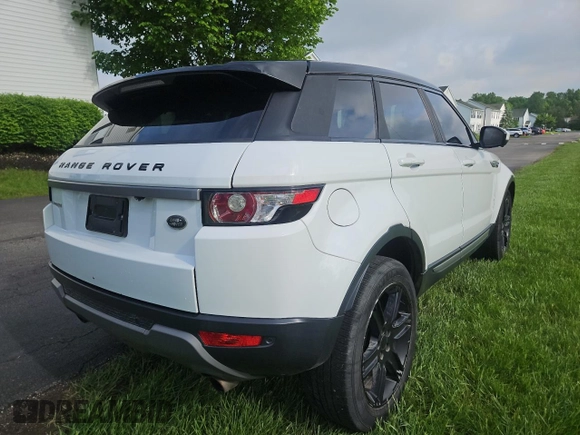 2014 Land Rover Range Rover Evoque Pure Premium z VIN SALVR2BG8EH863485, wystawiony jako Copart lot #57249785 z przebiegiem 133 937 mil mil oraz Czysty tytuł • Clean title. Historia ofert i sprzedaży dostępna na DreamBid. Obrazek 4.