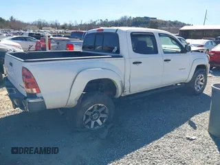 2007 Toyota Tacoma with VIN 5TELU42N97Z387675, listed as a IAAI auction lot 41687877 with 244,973 mi miles and . Bid and sale history available at DreamBid. Image 4.