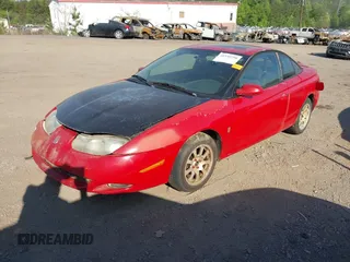 2002 Saturn SC with VIN 1G8ZY12742Z297685, listed as a IAAI auction lot 41930798 with Not Provided miles. Bid and sale history available at carsss.com. Image 2.
