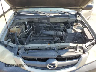 2004 Mazda Tribute DX with VIN 4F2YZ02B74KM13874, listed as a Copart auction lot 65422864 with 288,215 mi miles and Salvage Title. Bid and sale history available at carsss.com. Image 12.