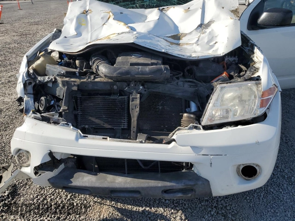 2014 Nissan Frontier S with VIN 1N6AD0ER7EN752186, listed as a Copart auction lot 87308234 with 287,851 mi miles and Salvage title. Bid and sale history available at DreamBid. Image 13.