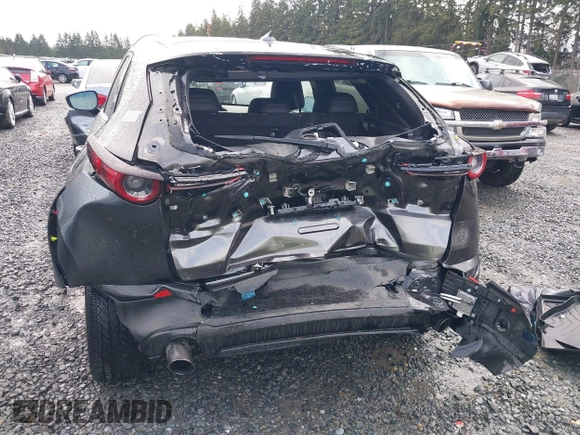 2021 Mazda CX-30 Premium with VIN 3MVDMBDY2MM239231, listed as a IAAI auction lot 41655159 with 22,679 mi miles and . Bid and sale history available at carsss.com. Image 6.