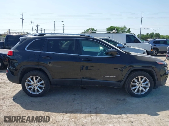 2014 Jeep Cherokee Limited with VIN 1C4PJMDS5EW242544, listed as a IAAI auction lot 42213907 with 114,515 mi miles and . Bid and sale history available at DreamBid. Image 13.