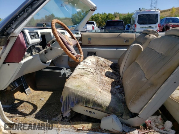 1976 Cadillac Eldorado z VIN 6L67S4Q405945, wystawiony jako Copart lot #73257834 z przebiegiem 98 761 mil mil oraz Nie do naprawy • Non repairable. Historia ofert i sprzedaży dostępna na DreamBid. Obrazek 7.