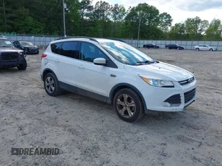 2016 Ford Escape SE z VIN 1FMCU0GXXGUA64789, wystawiony jako IAAI lot #42192188 z przebiegiem 135 528 mil mil oraz . Historia ofert i sprzedaży dostępna na DreamBid. Obrazek 1.