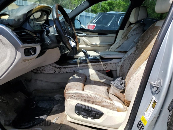 2016 BMW X5 xDrive35i with VIN 5UXKR0C5XG0P19819, listed as a Copart auction lot 49900575 with 0 mi miles and Clean Title. Bid and sale history available at carsss.com. Image 7.