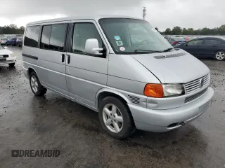 2003 Volkswagen EuroVan с VIN WV2KB47093H041606, выставлен на аукционе Copart как лот 73808224 с пробегом 228 496 миль миль и Чистый • Clean title. История ставок и продаж доступна на DreamBid. Изображение 4.