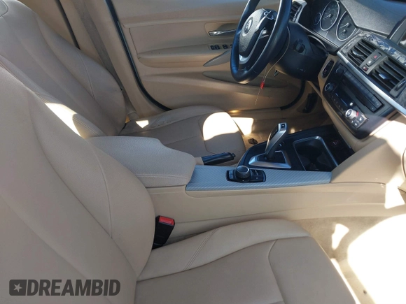 2014 BMW 3 Series 328i xDrive with VIN WBA3B3C56EJ981496, listed as a IAAI auction lot 41822862 with 137,700 mi miles. Bid and sale history available at carsss.com. Image 5.