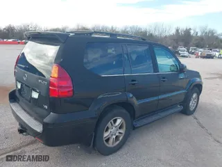 2003 Lexus GX 470 with VIN JTJBT20X630020473, listed as a IAAI auction lot 41511490 with 314,436 mi miles. Bid and sale history available at carsss.com. Image 4.