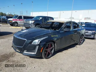 2014 Cadillac CTS AWD z VIN 1G6AW5SX6E0197020, wystawiony jako IAAI lot #41228636 z przebiegiem Nie podano mil oraz . Historia ofert i sprzedaży dostępna na DreamBid. Obrazek 2.
