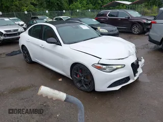 2021 Alfa Romeo Giulia Ti Sport z VIN ZARFAMBN9M7640461, wystawiony jako IAAI lot #42329442 z przebiegiem 43 266 mil mil oraz . Historia ofert i sprzedaży dostępna na DreamBid. Obrazek 1.
