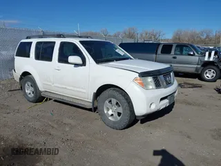 2007 Nissan Pathfinder SE z VIN 5N1AR18W17C612740, wystawiony jako IAAI lot #41969654 z przebiegiem 190 450 mil mil oraz . Historia ofert i sprzedaży dostępna na DreamBid. Obrazek 1.