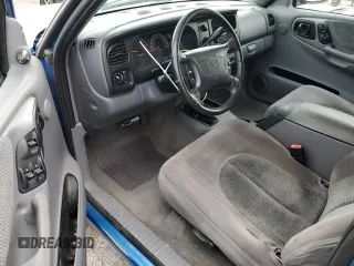 1999 Dodge Dakota SLT with VIN 1B7GG22Y7XS166815, listed as a Copart auction lot 48402125 with 176,458 mi miles and Salvage Title. Bid and sale history available at DreamBid. Image 8.