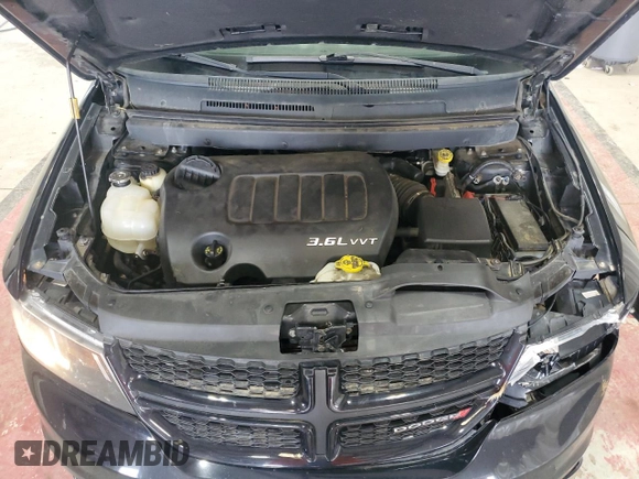 2015 Dodge Journey Crossroad with VIN 3C4PDDGGXFT725744, listed as a Copart auction lot 60808455 with 210,141 mi miles and Salvage title. Bid and sale history available at DreamBid. Image 12.