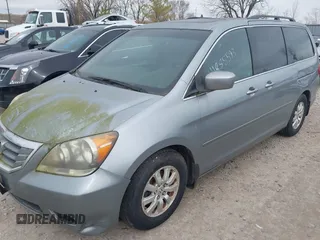 2008 Honda Odyssey EX-L with VIN 5FNRL38748B045957, listed as a IAAI auction lot 41885593 with 212,799 mi miles. Bid and sale history available at carsss.com. Image 2.