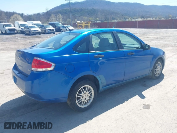 2011 Ford Focus SE with VIN 1FAHP3FN2BW111187, listed as a IAAI auction lot 42003148 with 119,083 mi miles. Bid and sale history available at carsss.com. Image 4.