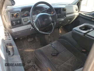 2002 Ford F-250 XL with VIN 1FTNW20F12EA44390, listed as a Copart auction lot 83888084 with 285,250 mi miles and Salvage Title. Bid and sale history available at DreamBid. Image 8.