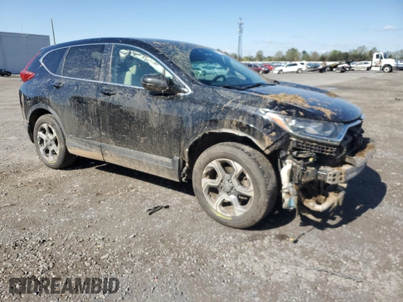 2018 Honda CR-V EX with VIN 7FARW2H54JE012712, listed as a Copart auction lot 52256715 with 69,767 mi miles and Salvage Title. Bid and sale history available at DreamBid. Image 4.