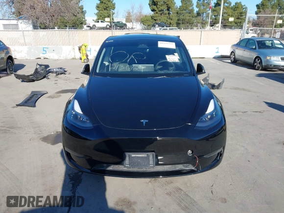 2024 Tesla Model Y Long Range with VIN 7SAYGDEEXRF983040, listed as a IAAI auction lot 41555332 with 79,506 mi miles and . Bid and sale history available at DreamBid. Image 12.