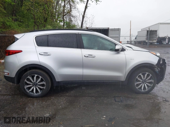 2018 Kia Sportage EX z VIN KNDPNCAC8J7309766, wystawiony jako IAAI lot #42219243 z przebiegiem 90 745 mil mil oraz . Historia ofert i sprzedaży dostępna na DreamBid. Obrazek 13.