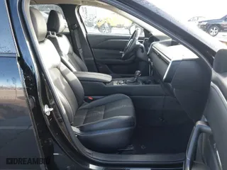 2023 Mazda CX-50 2.5 S Preferred Plus Package with VIN 7MMVABCM6PN133954, listed as a IAAI auction lot 41408858 with 40,950 mi miles. Bid and sale history available at carsss.com. Image 5.