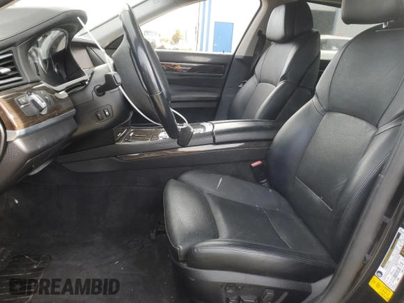 2012 BMW 7 Series with VIN WBAKX8C52CC198431, listed as a Copart auction lot 75295664 with 72,818 mi miles and Clean title. Bid and sale history available at DreamBid. Image 7.