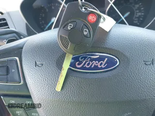 2017 Ford Escape SE with VIN 1FMCU0G97HUB49124, listed as a IAAI auction lot 41775132 with 103,069 mi miles. Bid and sale history available at carsss.com. Image 11.