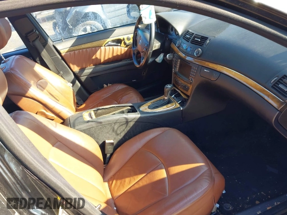 2007 Mercedes-Benz E-Class 3.5L with VIN WDBUF87X27X215963, listed as a IAAI auction lot 41424948 with 117,508 mi miles. Bid and sale history available at carsss.com. Image 5.