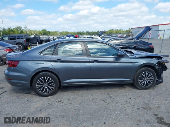 2021 Volkswagen Jetta S z VIN 3VWC57BU7MM013061, wystawiony jako IAAI lot #42148885 z przebiegiem 47 367 mil mil oraz . Historia ofert i sprzedaży dostępna na DreamBid. Obrazek 14.