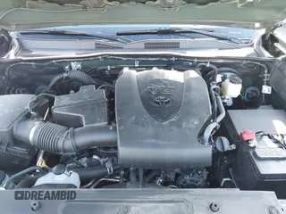 2021 Toyota Tacoma SR z VIN 3TMCZ5AN7MM395940, wystawiony jako IAAI lot #41860127 z przebiegiem 39 338 mil mil oraz . Historia ofert i sprzedaży dostępna na DreamBid. Obrazek 10.