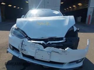 2016 Tesla Model S 90D with VIN 5YJSA1E26GF147327, listed as a IAAI auction lot 42077766 with 89,502 mi miles and . Bid and sale history available at DreamBid. Image 12.