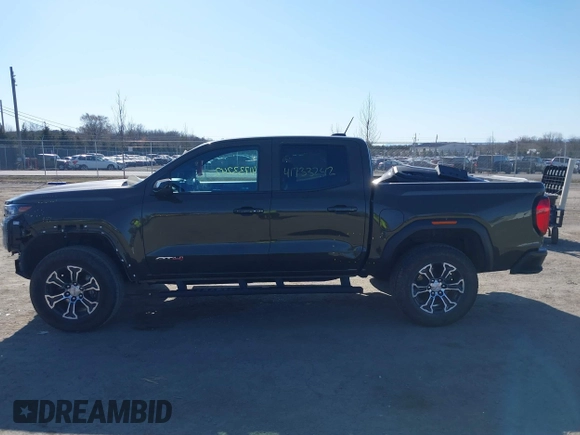 2023 GMC Canyon 4WD AT4 with VIN 1GTP6DEK1P1174713, listed as a IAAI auction lot 41733242 with 35,705 mi miles. Bid and sale history available at carsss.com. Image 14.