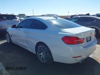 2015 BMW 4 Series 428i with VIN WBA3N3C51FK232902, listed as a IAAI auction lot 41547137 with 136,306 mi miles and . Bid and sale history available at DreamBid. Image 3.
