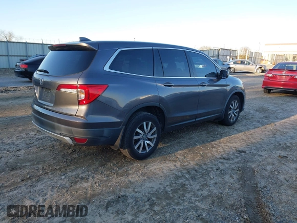 2019 Honda Pilot EX-L z VIN 5FNYF5H5XKB026513, wystawiony jako IAAI lot #41269623 z przebiegiem 62 372 mil mil oraz . Historia ofert i sprzedaży dostępna na DreamBid. Obrazek 4.