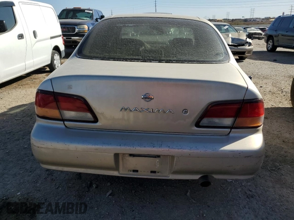 1998 Nissan Maxima GXE with VIN JN1CA21D0WM903051, listed as a Copart auction lot 47821445 with 156,748 mi miles and Salvage title. Bid and sale history available at DreamBid. Image 6.