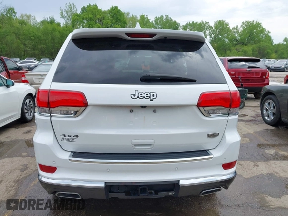 2015 Jeep Grand Cherokee Summit with VIN 1C4RJFJG5FC104087, listed as a IAAI auction lot 42100298 with 88,710 mi miles and . Bid and sale history available at DreamBid. Image 16.