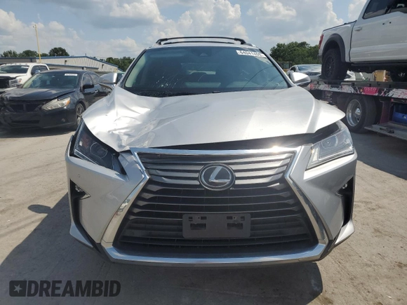 2018 Lexus RX 350L Premium с VIN JTJDZKCA0J2007265, выставлен на аукционе Copart как лот 64041405 с пробегом 73 050 миль миль и Списание • Salvage title. История ставок и продаж доступна на DreamBid. Изображение 5.