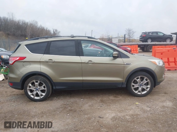 2013 Ford Escape SEL with VIN 1FMCU0HX9DUC77808, listed as a IAAI auction lot 41967998 with 71,196 mi miles. Bid and sale history available at carsss.com. Image 13.