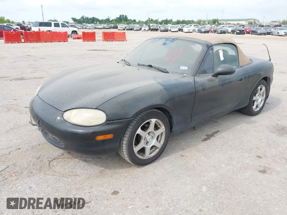1999 Mazda MX-5 Miata with VIN JM1NB353XX0126008, listed as a IAAI auction lot 42435673 with 194,313 mi miles and . Bid and sale history available at DreamBid. Image 2.