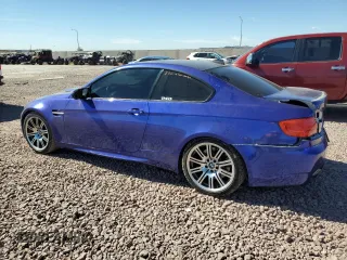 2011 BMW M3 with VIN WBSKG9C50BE369021, listed as a Copart auction lot 77999704 with 77,897 mi miles and Salvage Title. Bid and sale history available at carsss.com. Image 2.