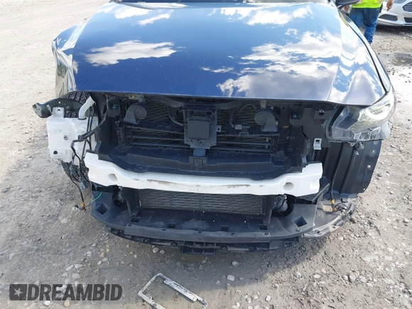 2021 Mazda CX-9 Grand Touring with VIN JM3TCBDY4M0513099, listed as a IAAI auction lot 42563530 with 76,006 mi miles and . Bid and sale history available at DreamBid. Image 6.